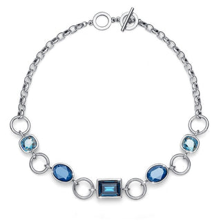 Collar punto de luz azul real. Rodio