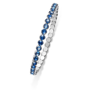 Bracciale elastico. Metallo Rodiato con cristalli blu