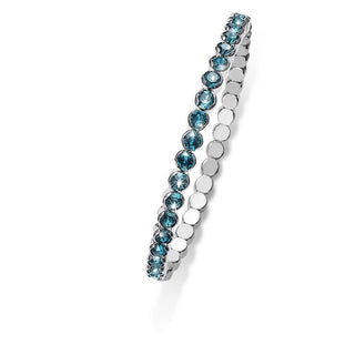 Bracciale elastico. metallo rodiato con cristalli azzurri